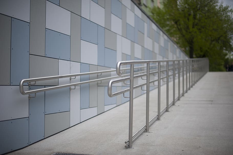 A wheelchair ramp for persons with disabilities to make spaces more accessible.